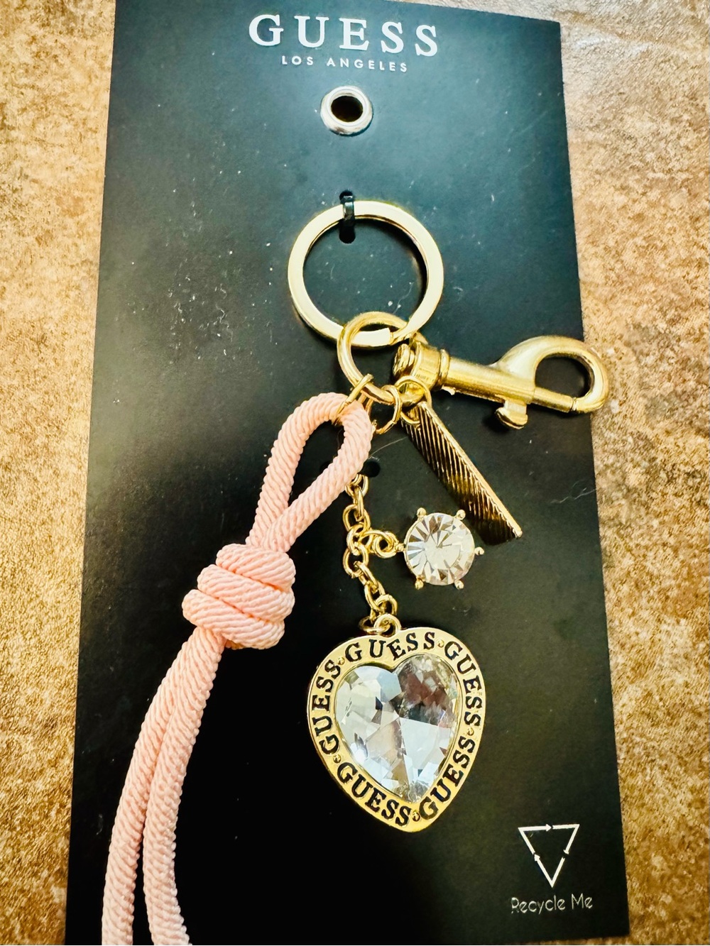 GUESS Gold-Tone Heart Crystal Keyring with Pink Cord Tassel